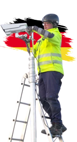 NetCo technician installing a camera on the construction site